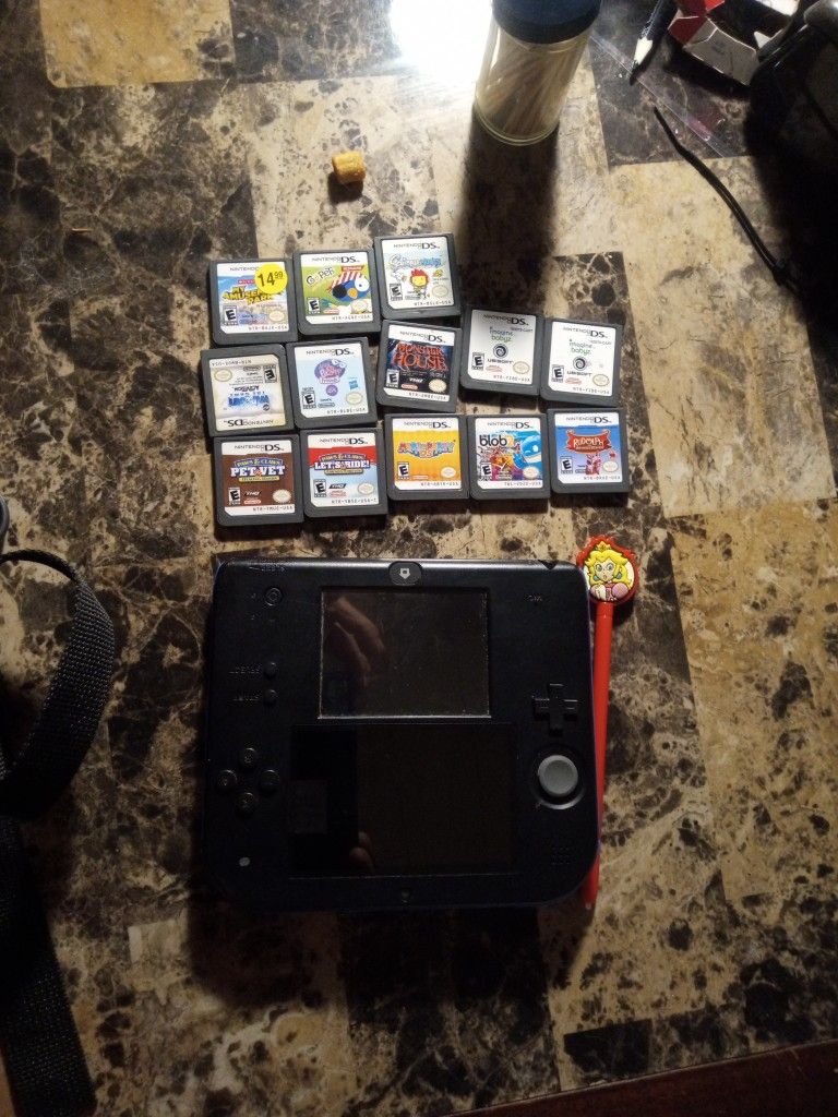 Nintendo DS blue with 13 games and bag