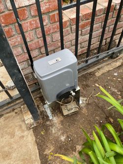 Electric gate shaking, dragging, or jamming? I fix chain, rollers, and tracks
