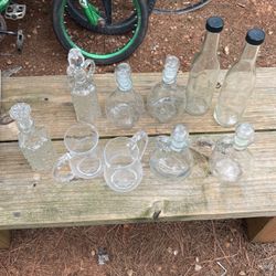 Assorted Bottles, Decanters, and Small Pitchers 