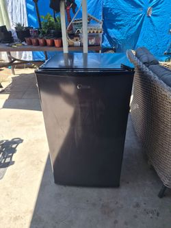 midea small refrigerator for sale like new needs AC  gas or refrigerator gas