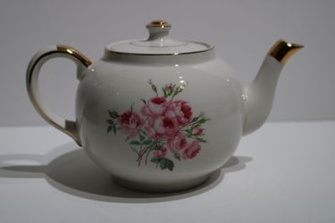 Porcelain teapot with gold accents