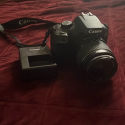 canon camera with battery and charger 