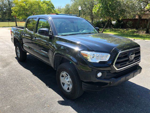 Looks completely new2019 Toyota Tacoma SR5 Truck Loaded clean title low low miles only about 9k full warranty full warranty