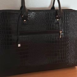 Black self charging purse