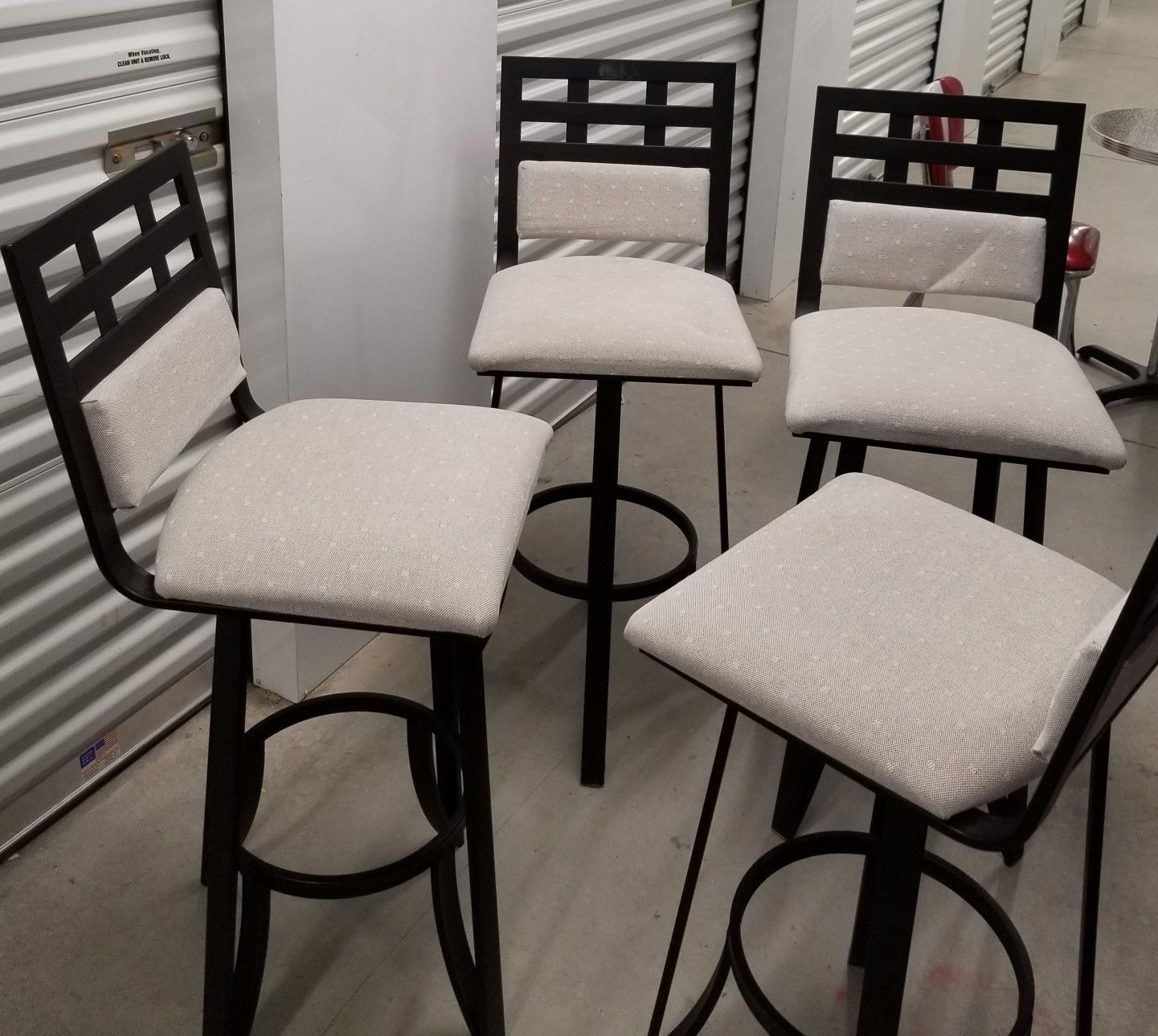 Swivel bar stools, $275 for the set or $75 each