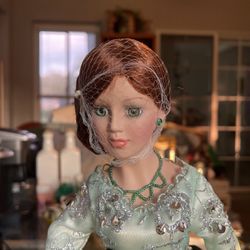 Porcelain Peacock Doll