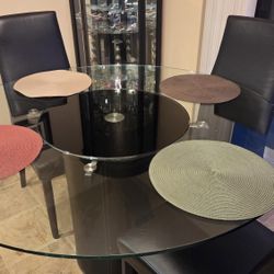 Elegant Glass Dining Table With Rotating Center