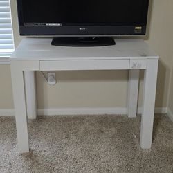 Sony Bravia TV + White Table + Fire TV 4K Stick