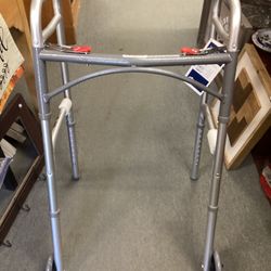 Adult Deluxe Folding Walker Two Button With 5” Wheels.