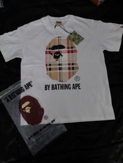 By a bathing bape T shirt