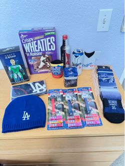 Dodgers lot Pez, Wheaties, action figure, socks, coozies +