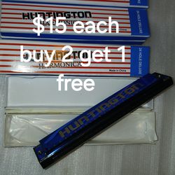 Brand new 2 octave; 24 hole weekender harmonica key of C