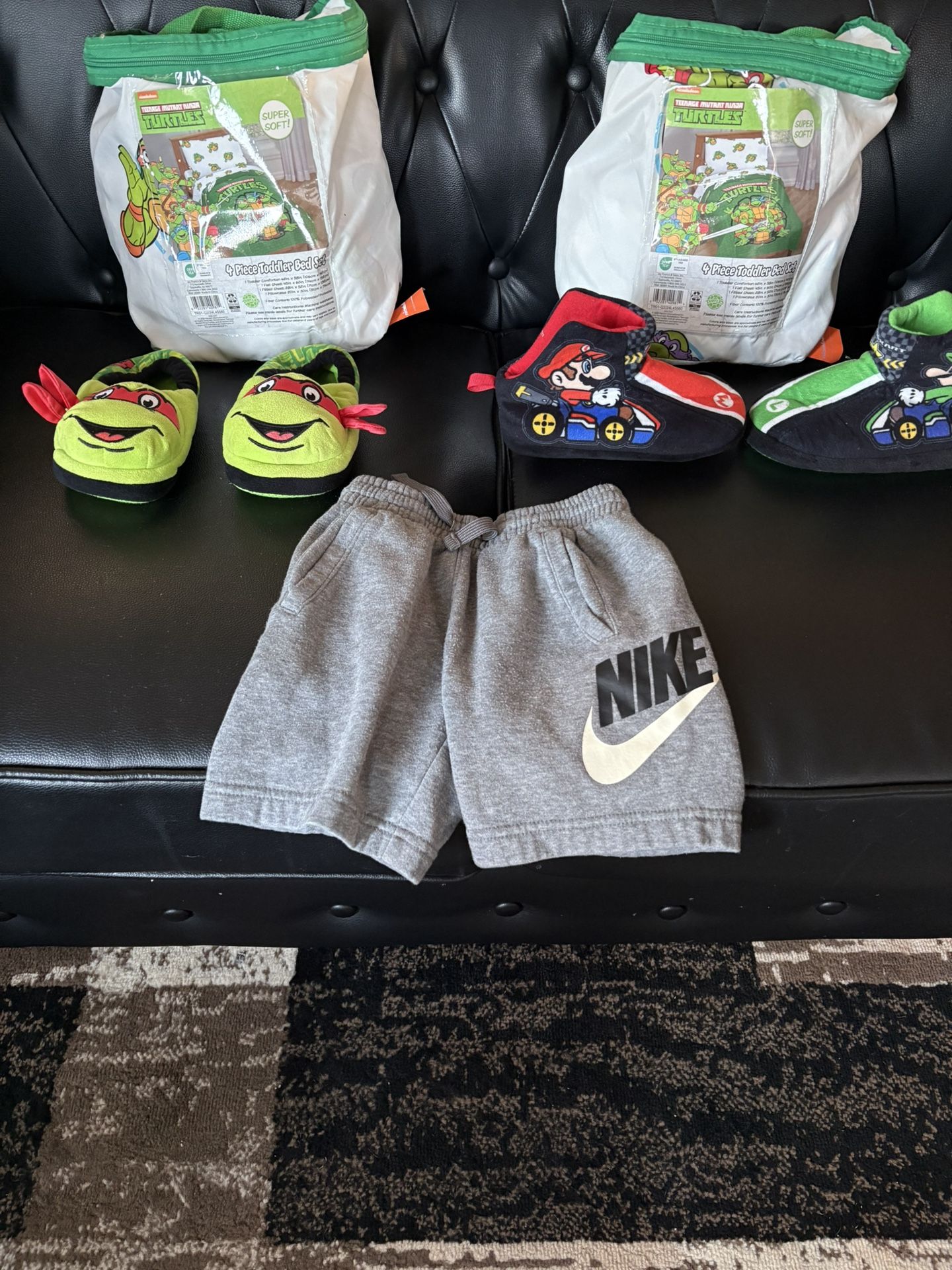 NINJA TURTLE SHEETS FOR TODDLER BED $18 Each MARIO AND NINJA TURTLE SLIPPERS SIZE 11/12 $7 EACH NIKE SHORTS SIZE 4T $5