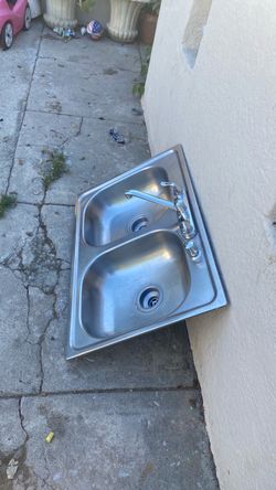 Stainless Steel Double Basin Kitchen Sink good condition with a faucet almost new included standard size kitchen sink