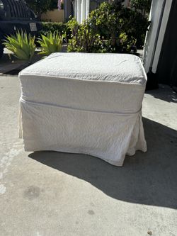 Upholstered ottoman- small