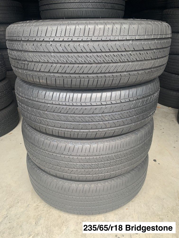 235/65/r18 Bridgestone ALL FOUR (4) TIRES
