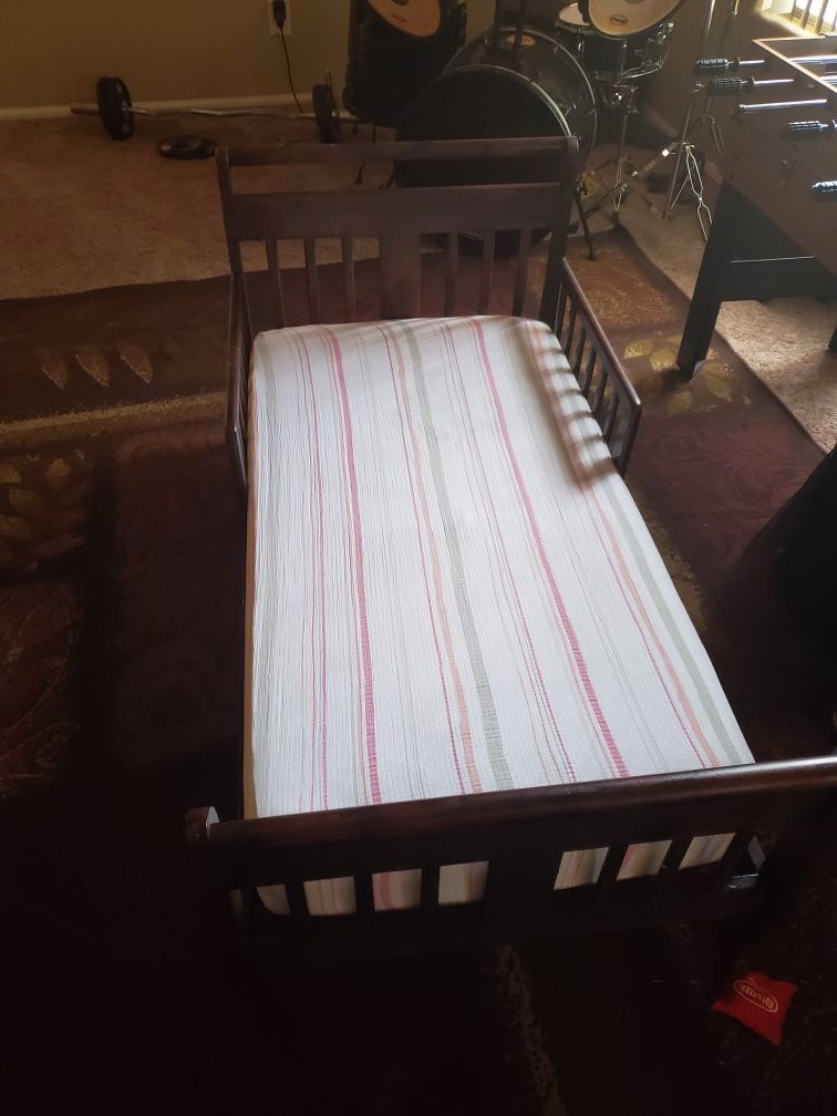 Wooden toddler bed and mattress