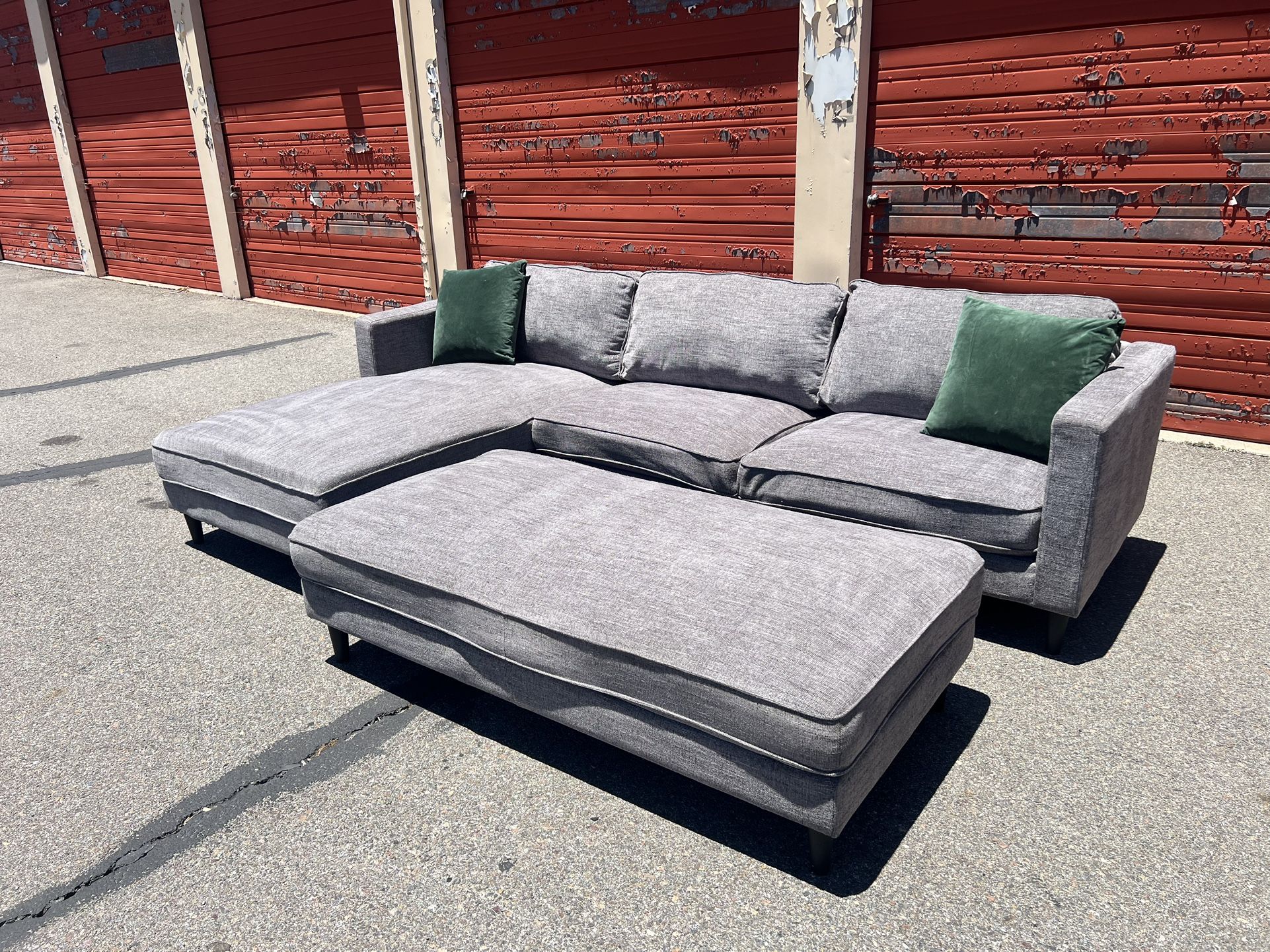 Living Spaces Gray Sectional Sofa Chaise With Ottoman