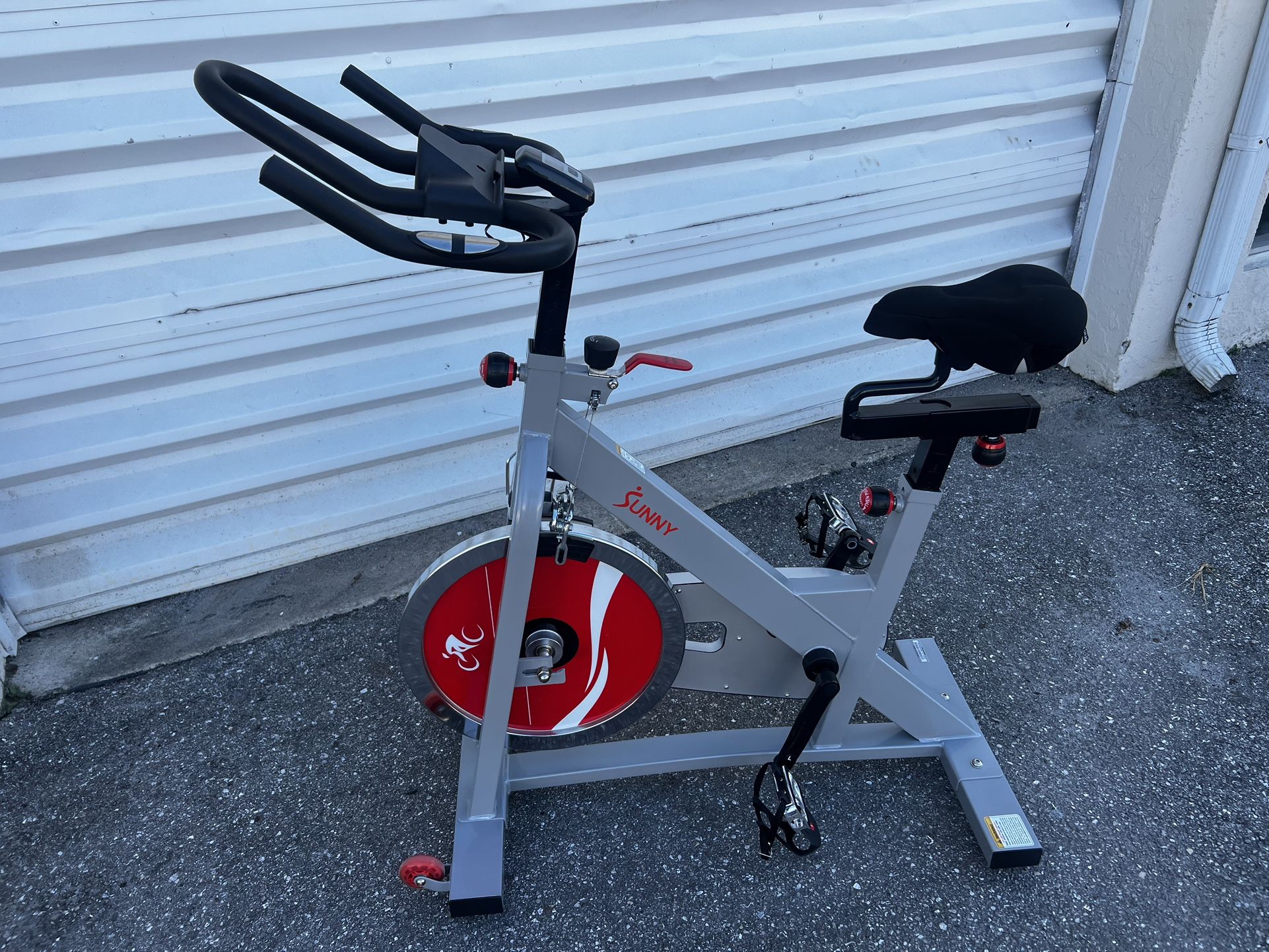 Delivery Available! Sunny Health & Fitness Pro II Indoor Cycling Stationary Bike with Device Mount and Advanced Display! Brand new!
