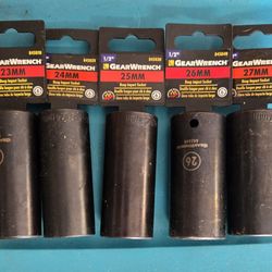  GEARWRENCH 1/2" drive deep impact sockets. Got a set here with 23mm, 24mm, 25mm, 26mm, and 27mm sizes.l