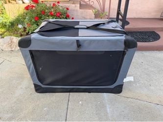 Dog crate in good condition  3 feet wide  2 feet side  2 feet high