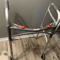 Two Walkers, A Wheelchair And A Cane.