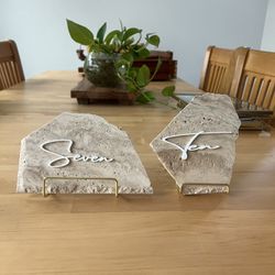 Travertine Tile Pieces, Table Numbers, And Signs 