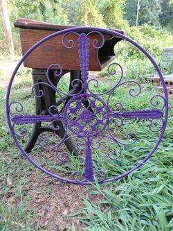 Purple metal wall decor  24 in diameter