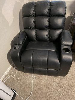 Reclining massaging chair