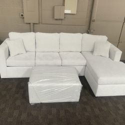 New White Cream Sectional And Ottoman 