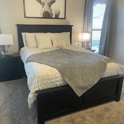 Queen bed frame with 2 matching night stands and adjustable massaging base.