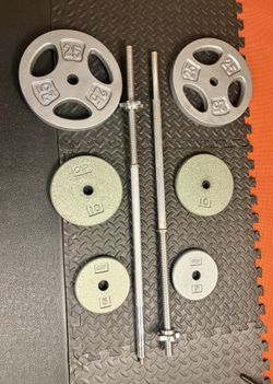 6 ft Steel Bar [ Split into two pieces] with Beautiful CAP Cast Iron Plates as good as NEW. Brute W: 100#