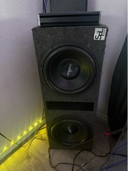 2 12s skar subwoofers with box and 1200w kicker amp