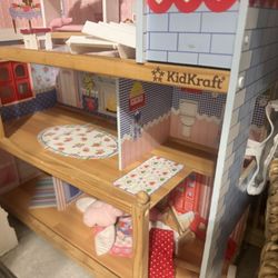 Doll House And Woven Rug