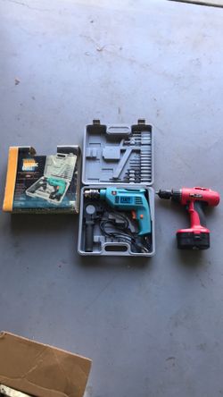 Drill with drill bits (new)
