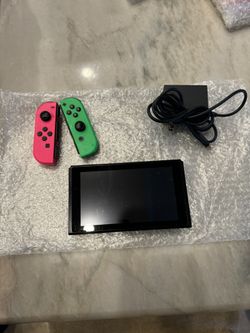 Nintendo Switch New Model ( Pink And Green) With Charger 