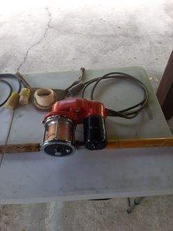12 volt fishing real & pole with etc.