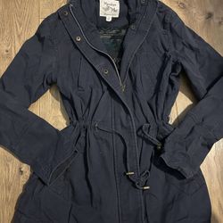 Maralyn and me brand small navy blue jack. Multi colored Pattern inside. Adjustable cinched waist. Long sleeve. Button and zipper front. 4 pockets on 