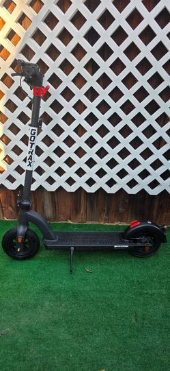 Gotrax G4 Electric Scooter with Seat, 10" Pneumatic Tires, Max 25 Mile Range and 20Mph Speed Power by 500W Motor, Double Anti-Theft Lock, Foldable E S