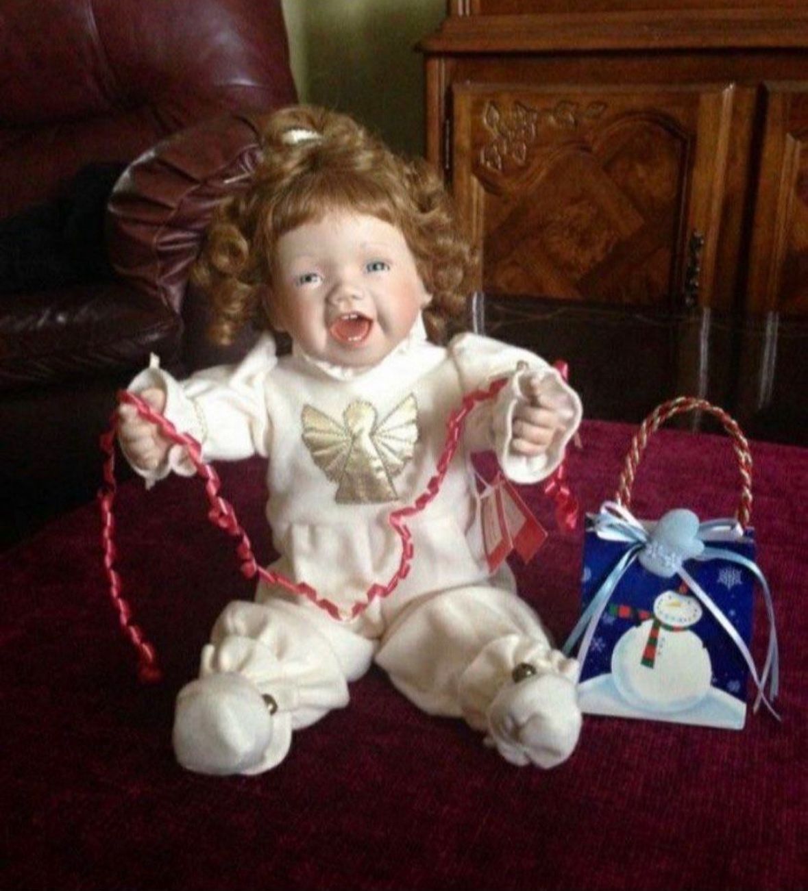 Ashton-Drake Porcelain Poseable Doll “My First Christmas".Excellent condition!