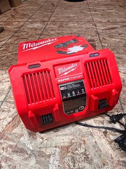 Like new Milwaukee M18 Dual Bay Rapid Charger with Two XC5.0 Batteries
