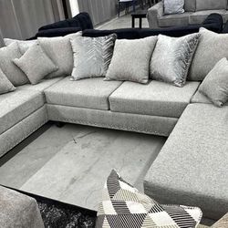 Grey Fabric Sectional With Double Chaise. Brand New. 