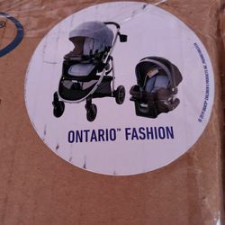 **Brand New In Box**Graco Modes Pramette Travel System, Baby Stroller with True Bassinet Mode and Reversible Seat