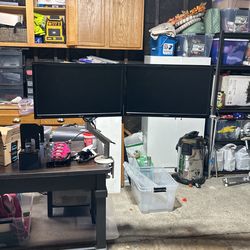 Two Monitors Attached With Ergo Desk Arm