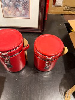 Red canisters with spoons