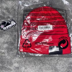 RED "WORLD FAMOUS" SUPREME BEANIE