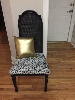 Cane accent chair w/ fur seat