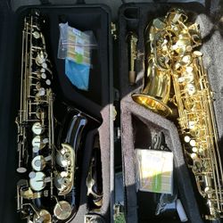 Black and Gold Alto Saxophone Excellent Condition $350 Each