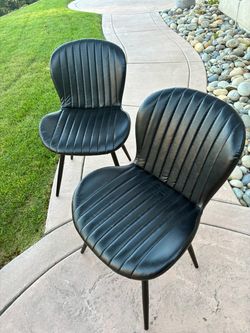 Brand new black faux leather chairs 4pcs