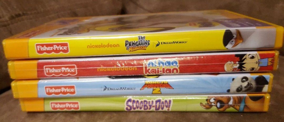Lot of 4 Fisher Price iXL Learning System. Scooby-Doo!, Kung Fu Panda 2, and ni hao kai•lan are new Nickelodeon The Penguins of Madagascar isn't